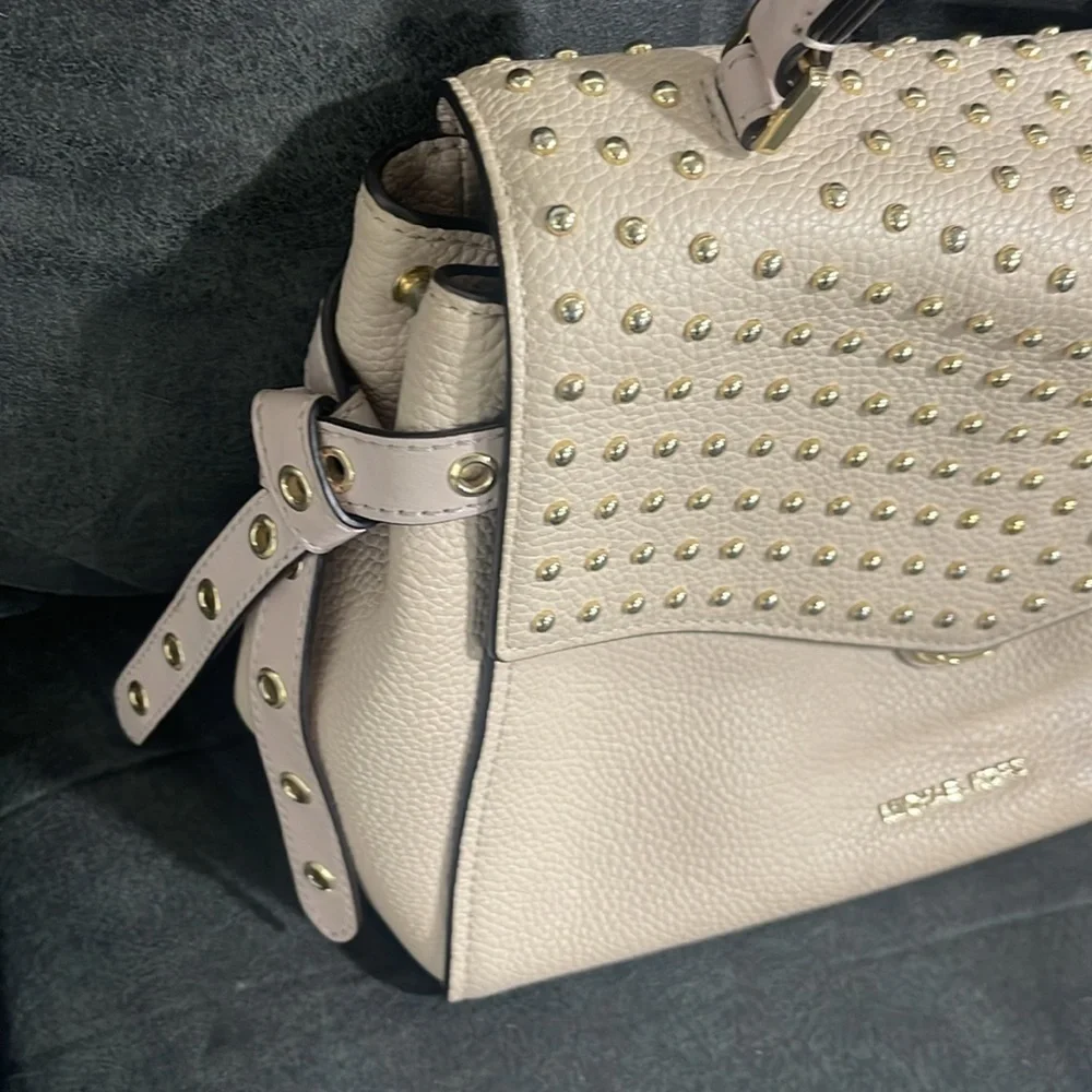 Michael Kors questions leave